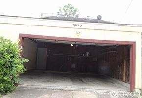 Houston house for rent - A garage with the number 8870 on the top of the building.