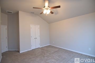Temple house for rent - A living room with a white sofa and a black coffee table.