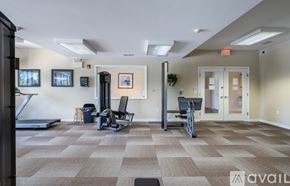 Mountville townhouse for rent - A gym with treadmills, elliptical machines, and a weight machine.