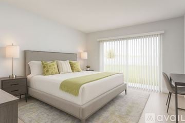 Miami Gardens apartment for rent - A bedroom with a large bed and a window with blinds.
