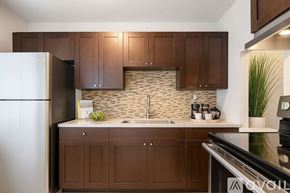 Miami Gardens apartment for rent - A living room with a sofa, armchairs, and a coffee table.