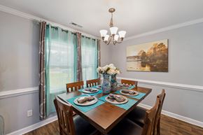 Jacksonville house for rent - A dining room with a table set for six.