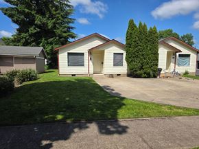 Monmouth apartment for rent - A row of houses with a tree in front of them.