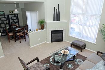 Redstone ranch apartments living room area with a fireplace