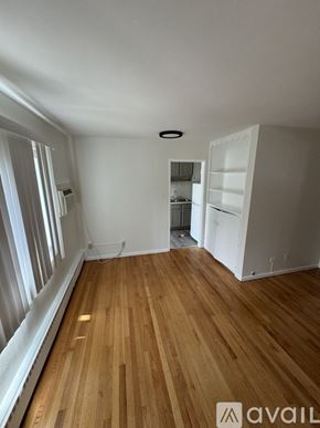 Hammond apartment for rent - A room with wooden floors and white walls.