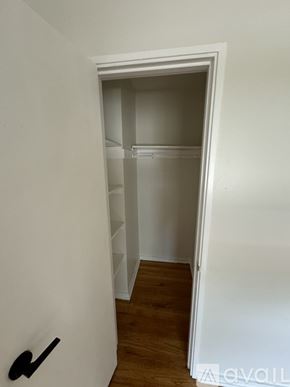 Hammond apartment for rent - A white doorway leads to a room with a wooden floor.