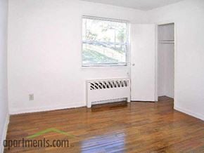 Falls Church apartment for rent - a living room with a wood floor and a window