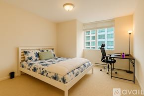 San Francisco apartment for rent - A bedroom with a bed, desk, and chair.