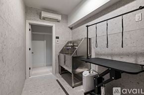 Brooklyn apartment for rent - A room with a staircase and a wall-mounted air conditioner.