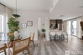 Brooklyn apartment for rent - A modern dining room with a glass table and chairs.