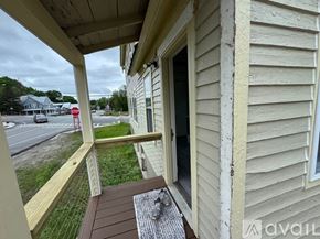 North Creek apartment for rent - A house with a red stop sign in the background.