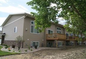 Fargo apartment for rent - a large house with a deck on the side of it