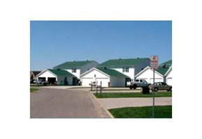 West Fargo townhouse for rent - a neighborhood of houses with green roofs and a no parking sign