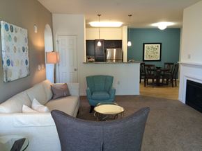 Blacksburg apartment for rent - a living room with a couch and a chair