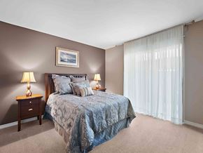 Metairie apartment for rent - a bedroom with a bed and a window