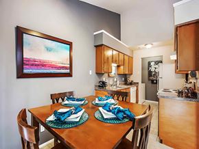 Carrollton apartment for rent - a kitchen and dining room with a table and chairs