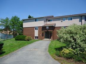 Dartmouth apartment for rent - A building with a driveway in front of it.