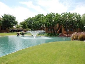 Chandler apartment for rent - a large pool of water with a fountain in the middle