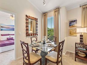 Plano apartment for rent - a dining room with a table and chairs