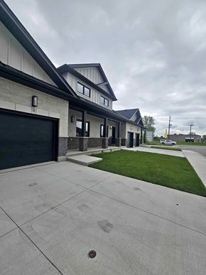 Corunna house for rent - A modern house with a grey garage door.
