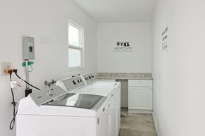 Coronado apartment for rent - A laundry room with a washer and dryer.