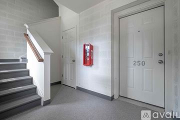 Mountville apartment for rent - A kitchen with dark wood cabinets and stainless steel appliances.
