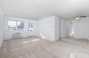 Millersville apartment for rent - A red brick house with a white door and a small porch.