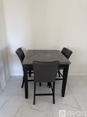 Rotonda West apartment for rent - A dining room with a table and chairs.
