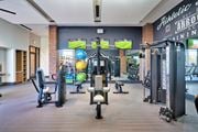 Herndon apartment for rent - A gym with a variety of equipment including a rowing machine.