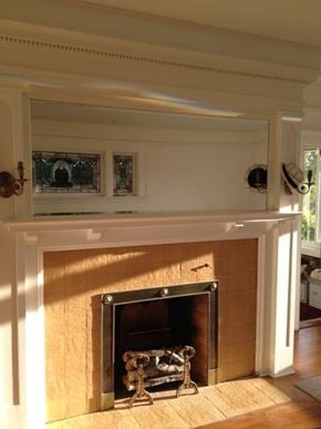 Victoria apartment for rent - A fireplace with a fire burning in it.