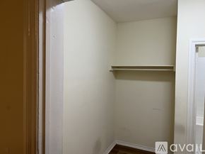 Los Angeles apartment for rent - A small, empty room with a shelf and a door.