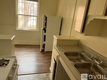 Los Angeles apartment for rent - A kitchen with a stove, sink and refrigerator.