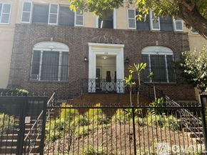 Los Angeles apartment for rent - A brick building with a white door and windows.