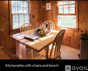Port Ewen house for rent - A kitchenette with chairs and a bench is available.