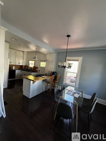 Grand Rapids house for rent - A kitchen with a dining table and chairs.