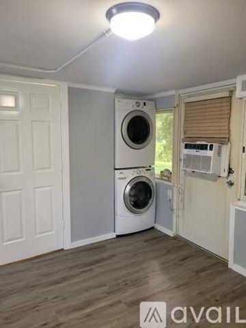 Auburndale apartment for rent - A kitchen with a marble countertop and stainless steel appliances.