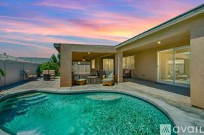 Indio house for rent - A modern house with a swimming pool in the backyard.