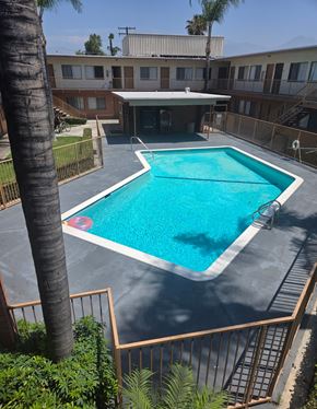 Pomona multi-family for rent - A pool with a gate.