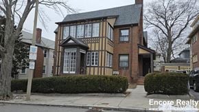 Boston house for rent - A house with a sign that says Encore Realty.