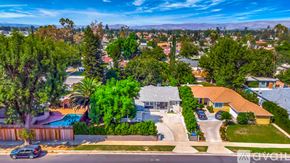 Los Angeles house for rent - A suburban neighborhood with houses and trees.