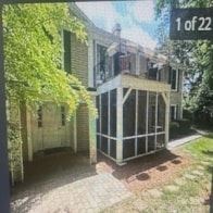 Charlotte apartment for rent - A sunroom attached to a house is shown in the image.
