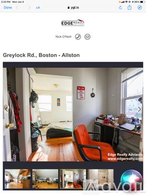 Boston apartment for rent - A room with a bed, a chair, and a desk.