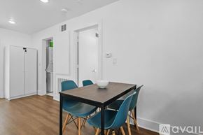Dallas apartment for rent - A dining room with a table and chairs.