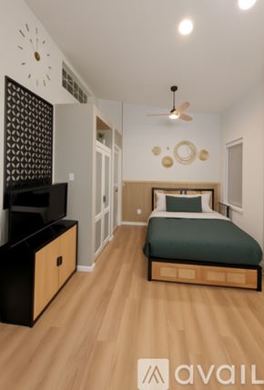 Ontario townhouse for rent - A living room with wooden floors and a couch.