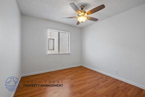 Los Angeles apartment for rent - A room with a ceiling fan and a window with blinds.