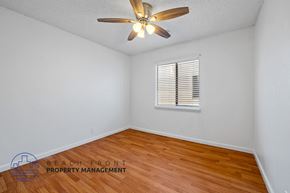 Los Angeles apartment for rent - A room with a ceiling fan and wooden flooring.