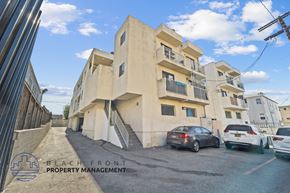 Los Angeles apartment for rent - A building with the words "BEACH FRONT PROPERTY MANAGEMENT" on the bottom left corner.