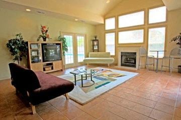 Farmville apartment for rent - a living room with a couch and a tv