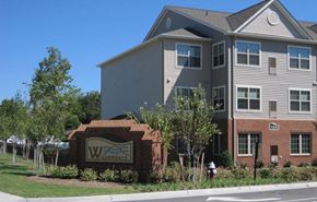 Hampton apartment for rent - a building with a sign in front of it