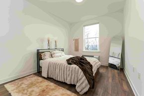 Bound Brook apartment for rent - A bedroom with a large bed and a window.
